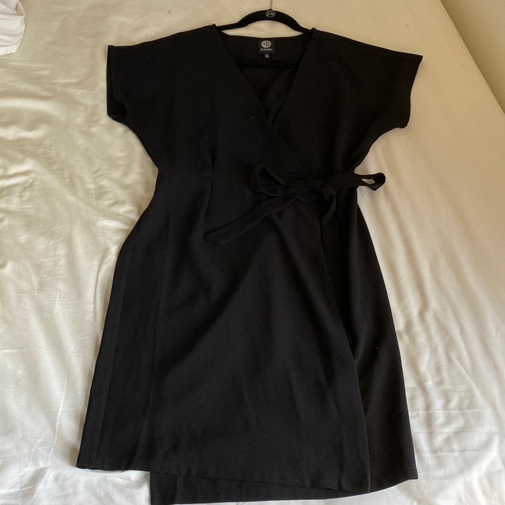 Wrap around dress with bow